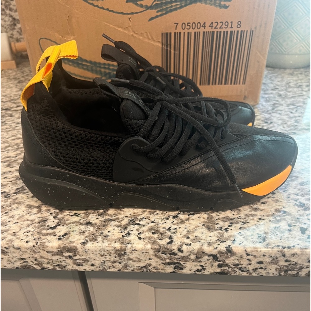 Black and Yellow Clearweather shoes. Only tried on. Brand new with box.